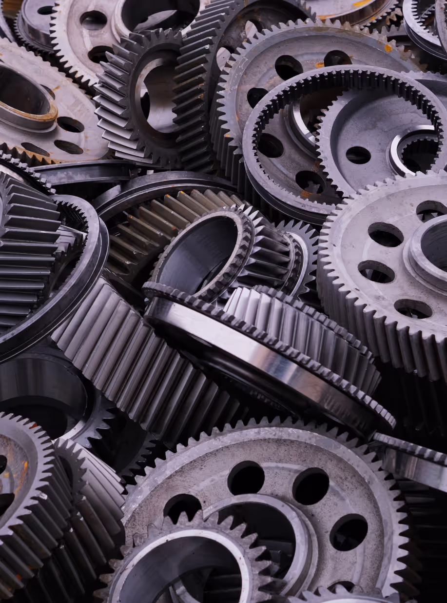 Pile of scrap steel gears for recycling