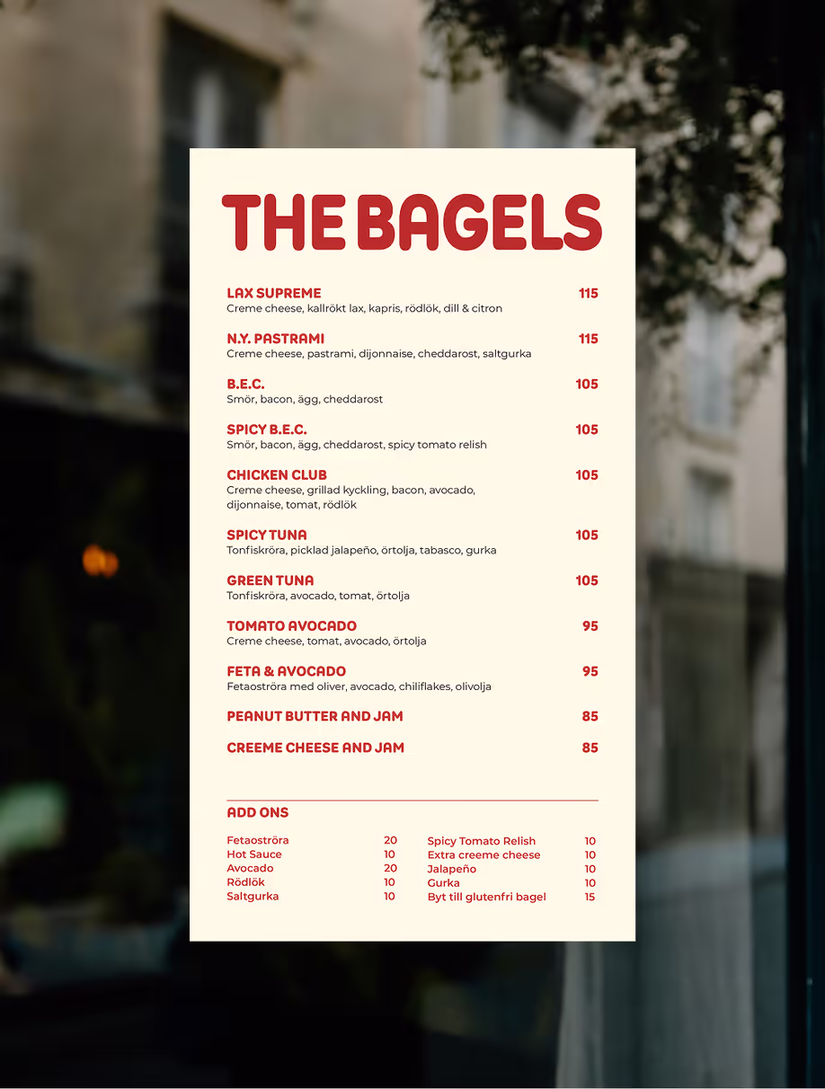 The Bagels menu listing fillings and prices in red on cream