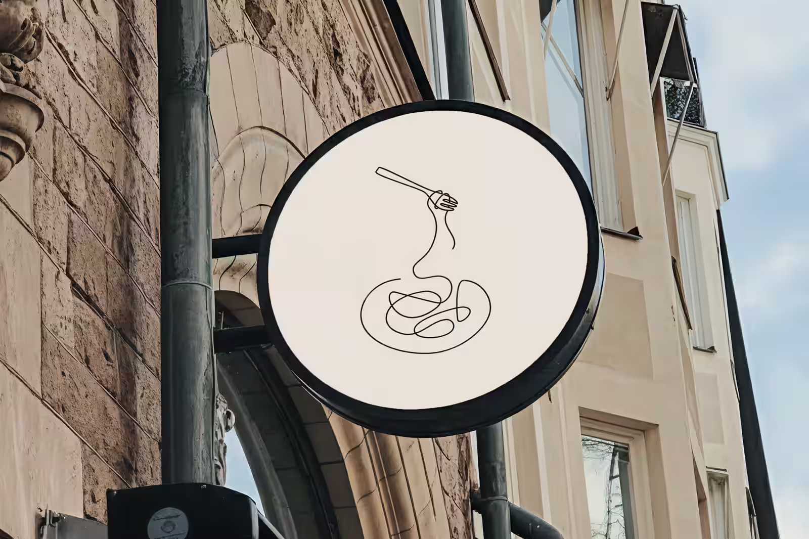 Round Cucina Povera sign with a one-line drawing of spaghetti twirled on a fork
