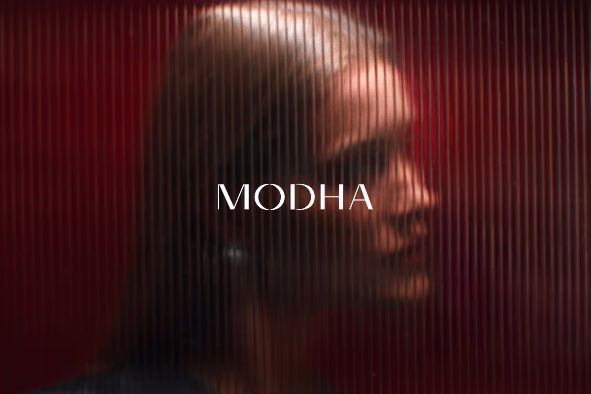 Modha Logo with imagry style background.