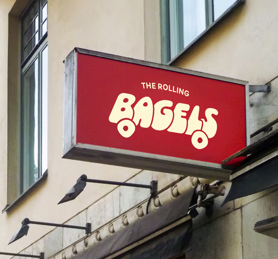 The Rolling Bagels logotype on the illuminated sign outside the Stockholm shop