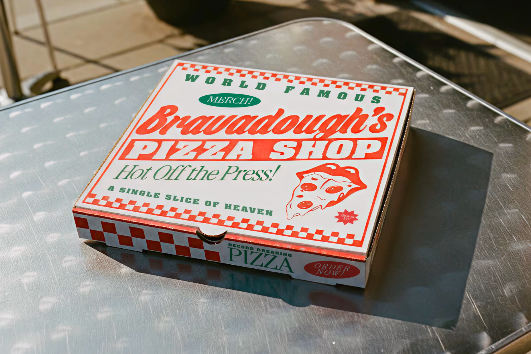 Custom Bravadough's Pizza Shop pizza box for Bravado's merch event